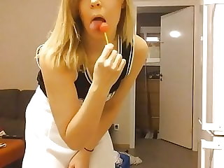 blonde amateur teasing with a lollipop